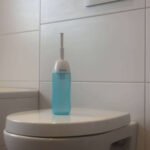 bumloo-bidet-blue-on-top-of-toilet